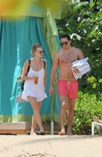 MARGOT ROBBIE in Bikini at a Beach in Hawaii 07/14/2016