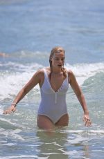 MARGOT ROBBIE in Swimsuit Surfing in Hawaii 07/19/2016