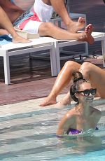 MEGAN MCKENNA and DANIELLE ARMSTRONG in Bikinis at a Pool in Mallorca 07/03/2016