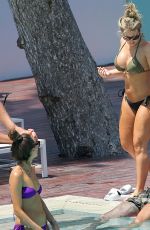 MEGAN MCKENNA and DANIELLE ARMSTRONG in Bikinis at a Pool in Mallorca 07/03/2016