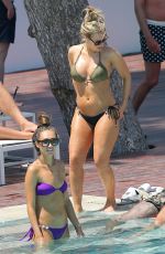 MEGAN MCKENNA and DANIELLE ARMSTRONG in Bikinis at a Pool in Mallorca 07/03/2016