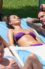 MEGAN MCKENNA and DANIELLE ARMSTRONG in Bikinis at a Pool in Mallorca 07/03/2016