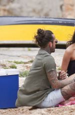 MEGAN MCKENNA in Bikini Having a Picnic on the Beach in Ibiza 06/29/2016