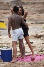 MEGAN MCKENNA in Bikini Having a Picnic on the Beach in Ibiza 06/29/2016