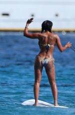 MELANIE BROWN in Bikini Paddleboarding in in Ibiza 07/01/2016