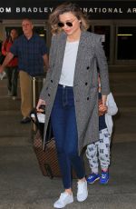 MIRANDA KERR at Los Angeles International Airport 07/03/2016