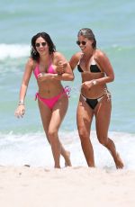 NATASHA OAKLEY and DEVIN BRUGMAN in Bikinis at a Beach in Miami 07/15/2016