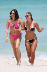 NATASHA OAKLEY and DEVIN BRUGMAN in Bikinis at a Beach in Miami 07/15/2016