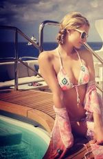 PARIS HILTON in Bikini at a Yatch in Ibiza 07/26/2016