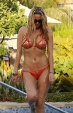 SARAH HARDING in Bikini  at a Pool in Dubai 06/13/2016