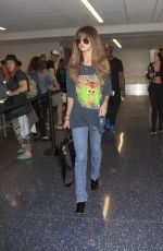 SELENA GOMEZ in Jeans at LAX Airport in Los Angeles 07/10/2016