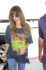 SELENA GOMEZ in Jeans at LAX Airport in Los Angeles 07/10/2016