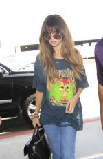 SELENA GOMEZ in Jeans at LAX Airport in Los Angeles 07/10/2016