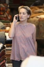 SHARON STONE and ZOE SALDANA Out in Beverly Hills 07/25/2016