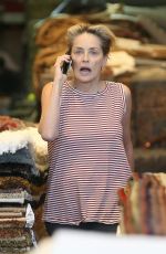 SHARON STONE and ZOE SALDANA Out in Beverly Hills 07/25/2016