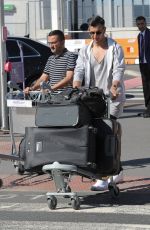 ABI CLARKE at Heathrow Airport in London 08/23/2016