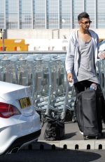 ABI CLARKE at Heathrow Airport in London 08/23/2016
