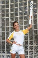 ALESSANDRA AMBROSIO Posing with the Olympic Torch in Rio De Janeiro, 08/052016