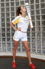 ALESSANDRA AMBROSIO Posing with the Olympic Torch in Rio De Janeiro, 08/052016