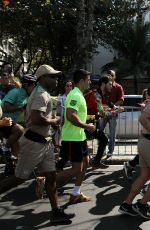 ALESSANDRA AMBROSIO Runs with Olympic Flame Through Rio De Janeiro 08/05/2016