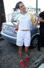 ALESSANDRA AMBROSIO Runs with Olympic Flame Through Rio De Janeiro 08/05/2016