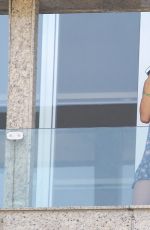 ALESSANDRA AMBROSIO Chatting on Phone on Balcony of Her Hotel in Rio de Janeiro 08/08/2016