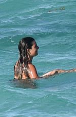 BELLA HADID in Bikini at a Beach in Turks and Caicos 08/12/2016