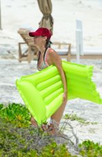 BELLA HADID in Bikini at a Beach in Turks and Caicos 08/12/2016