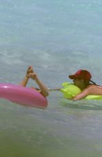 BELLA HADID in Bikini at a Beach in Turks and Caicos 08/12/2016