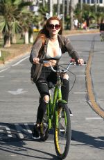 BELLA THORNE Riding Her Bike Out in Los Angeles 08/13/2016