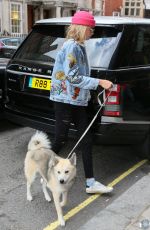 CARA DELEVINGNE Out with Her Dog in London 08/03/2016