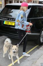 CARA DELEVINGNE Out with Her Dog in London 08/03/2016