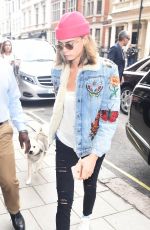 CARA DELEVINGNE Out with Her Dog in London 08/03/2016
