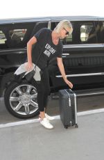 CHARLIZE THERON Arrives at LAX Airport in Los Angeles 08/12/2016 