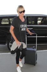 CHARLIZE THERON Arrives at LAX Airport in Los Angeles 08/12/2016 