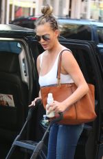 CHRISSY TEIGEN Leaves Her Hotel in New York 08/28/2016