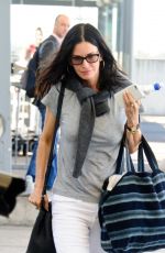 COURTENEY COX at Heathrow Airport in London 08/06/2016