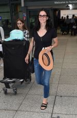 COURTENEY COX at Heathrow Airport in London 08/20/2016