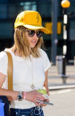 EMILIA CLARKE at Heathrow Airport in London 08/23/2016