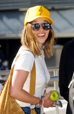 EMILIA CLARKE at Heathrow Airport in London 08/23/2016