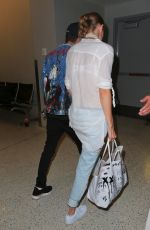 GIGI HADID at LAX Airport in Los Angeles 08/12/2016