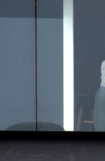 GISELE BUNDCHEN on the Balcony of Her Hotel in Rio De Janeiro 08/03/2016