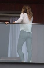 GISELE BUNDCHEN on the Balcony of Her Hotel in Rio De Janeiro 08/03/2016