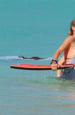 HEIDI KLUM in Swimsuit at a Beach in Caribbean 08/09/2016