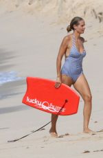 HEIDI KLUM in Swimsuit at a Beach in Caribbean 08/09/2016