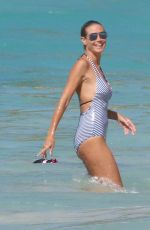 HEIDI KLUM in Swimsuit at a Beach in Caribbean 08/09/2016