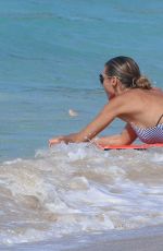 HEIDI KLUM in Swimsuit at a Beach in Caribbean 08/09/2016