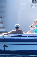 ISLA FISHER in Bikini at a Boat in The Islands of Lerins 08/06/2016