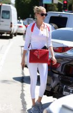 KATE UPTON Shopping at Mayfield in West Hollywood 08/19/2016