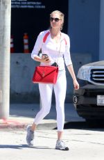 KATE UPTON Shopping at Mayfield in West Hollywood 08/19/2016